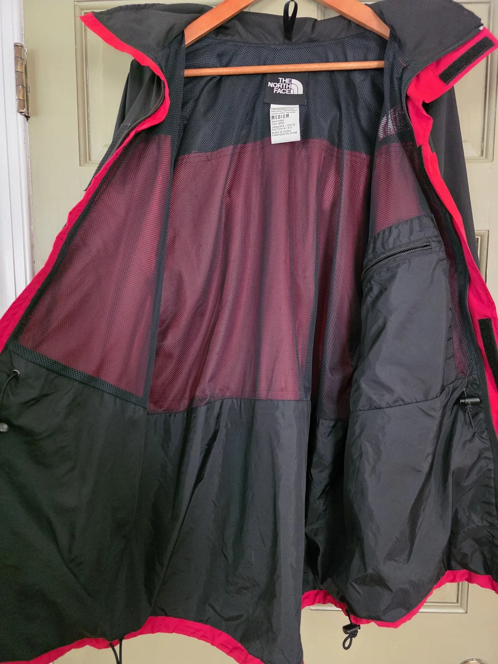 The North Face Men’s Two-Tone Red and Black Waterproof Jacket